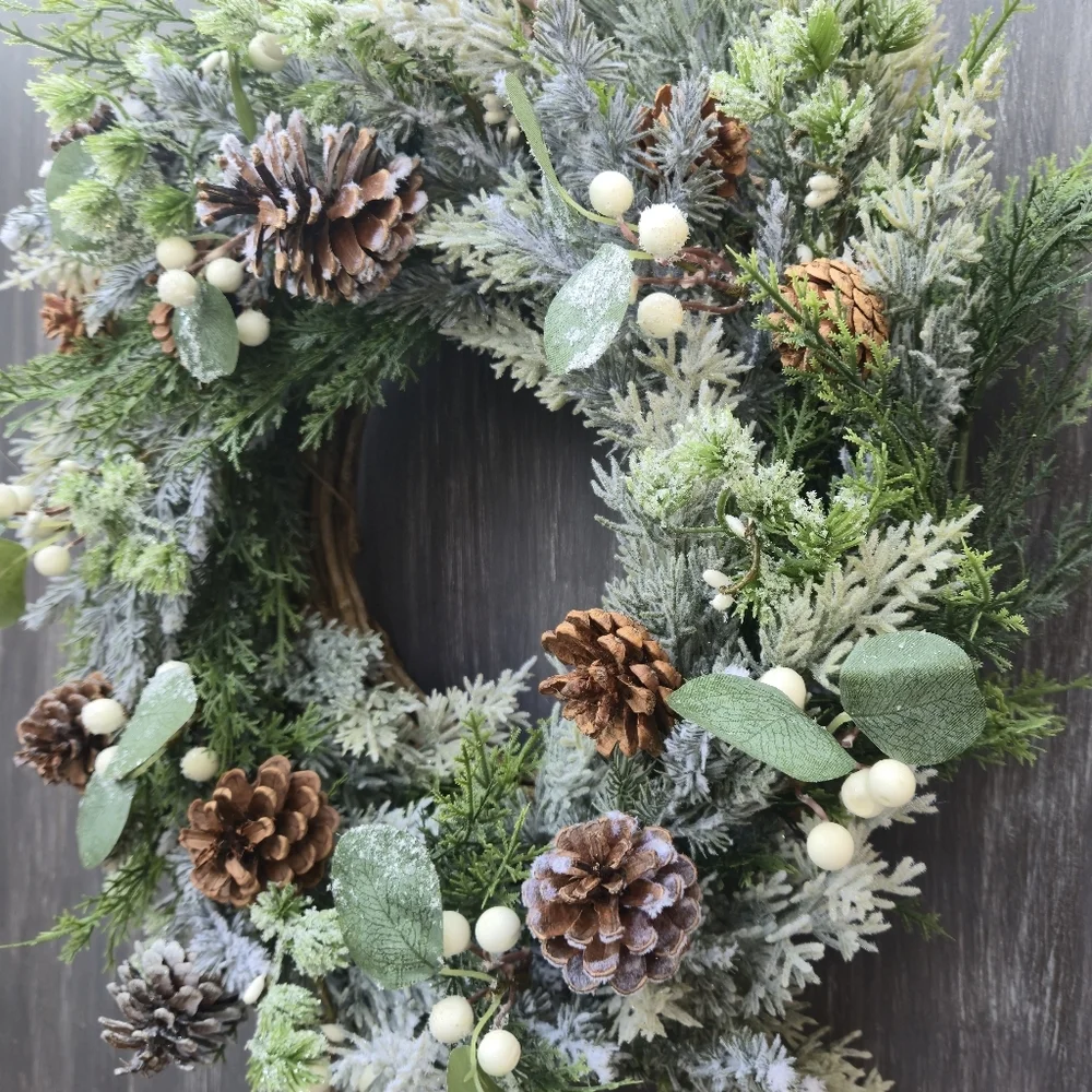 Handmade lush, artificial Winter Greenery Wreath With White And Brown Accents